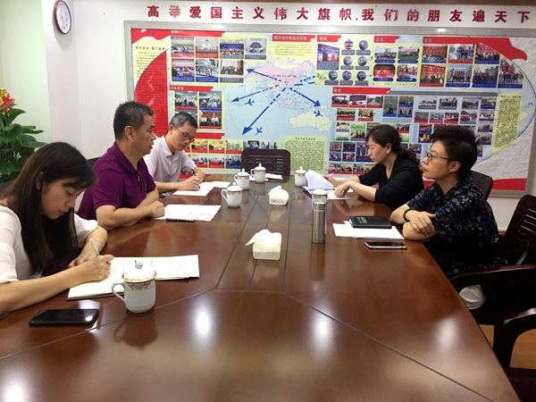 5月27日,陈金国副主委与中共梧州市委常委、统战部部长钟碧珍等座谈交流。_副本.jpg